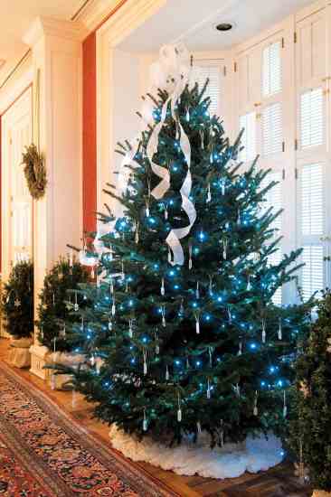 The traditional 9-foot tree in the Blair House bay window dazzles with hundreds of natural quartz crystals and superefficient LED lights.